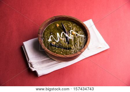 corn flour flat bread or roti or Makki Ki Roti with sarso da Saag or mustard leaves curry, Indian Food popular in winter season in north india
