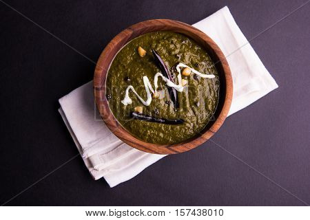 corn flour flat bread or roti or Makki Ki Roti with sarso da Saag or mustard leaves curry, Indian Food popular in winter season in north india