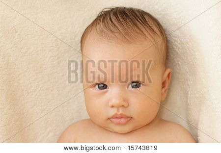 bright closeup portrait of adorable baby
