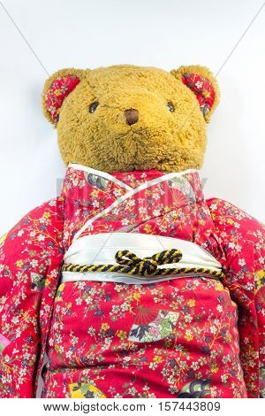 Isolated Cute Teddy bear in kimono costume with white background