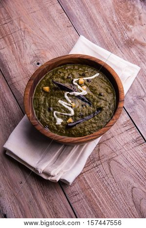corn flour flat bread or roti or Makki Ki Roti with sarso da Saag or mustard leaves curry, Indian Food popular in winter season in north india