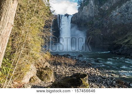 A view of Snoqualmie Falls from downriver.
