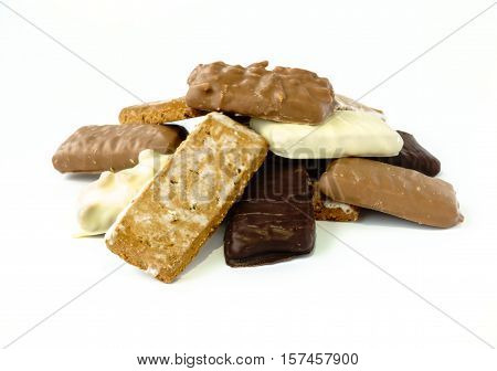 Closeup of different varieties of Aachener Printen a type of Lebkuchen isolated on white background.