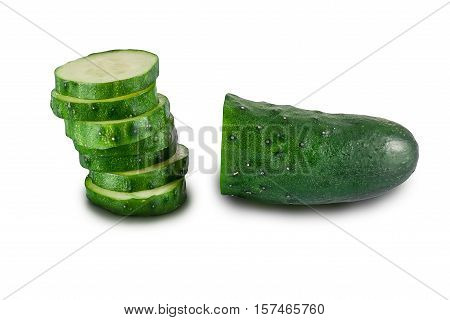 Рalf of cucumber and slices of cucumber on white background