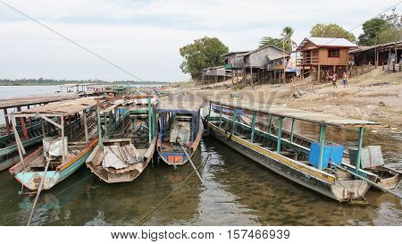 SI PHAN DON, LAOS - FEBRUARY 25, 2016: Typical village allong the Mekong river on February 25, 2016 in Laos, Asia