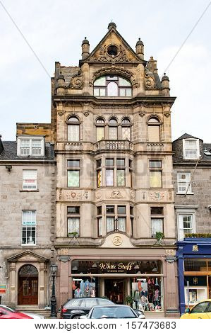 Edinburgh, Scotland, UK-circa July 2016:Small store with typical facade of a house in the street St Geroge