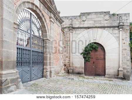 Manor entrance of palace with Roman arch