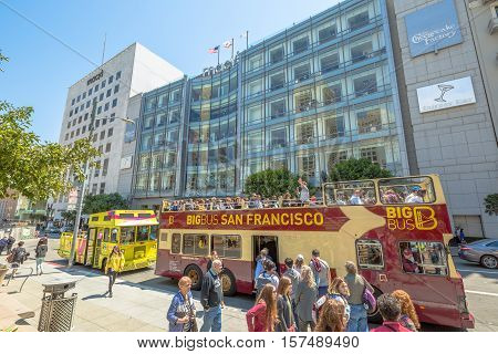San Francisco, California, United States - August 17, 2016: the Big Bus, Hop On Hop Off, Sightseeing Tour, the popular double-decker bus carrying tourists, standing in Union Square in San Francisco.