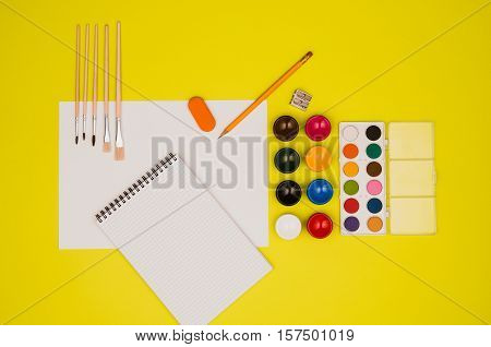 School table or desk seen from above. Top view product photograph. Shool or university concept image. Back to school background.