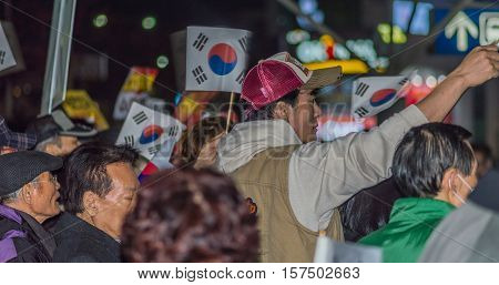 SEOUL, SOUTH KOREA, NOVEMBER 19,2016 Group of protesters outside Seoul Station rally against impeachment of President Park Geun-hye