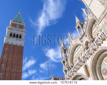 San Marco square in Venice with San Marco Basilica and tower.