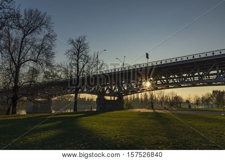 Litomerice bridge with sunset in autumn afternoon