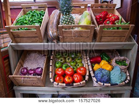 Vegetables and fruits on the wooden box in the street market