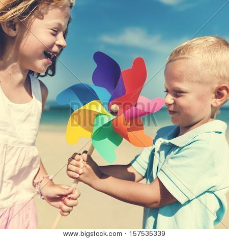 Kids Chlid Beach Sibling SIster Brother Blowing Concept