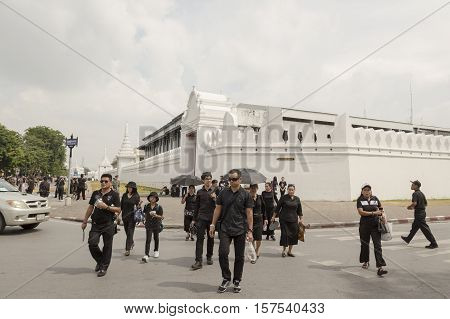 BANGKOK THAILAND - OCT 29 : The crowd of mourners on Maharaj Road near Wat Phra Kaew while the funeral of king Bhumibol Adulyadej in Grand Palace on october 29 2016