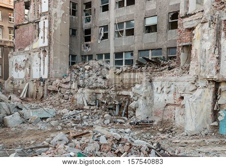 closeup of old building demolition after earthquake
