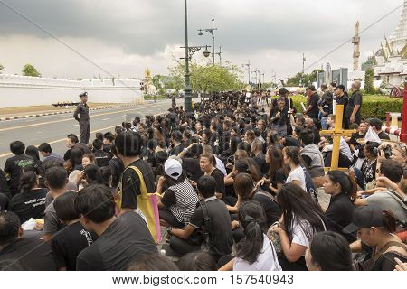 BANGKOK THAILAND - OCT 29 : The crowd of mourners on Sanam Chai road on the way to Sanam Luang while the funeral of king Bhumibol Adulyadej in Grand Palace on october 29 2016