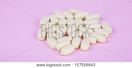 image of many hiv therapy efavirenz on pink background