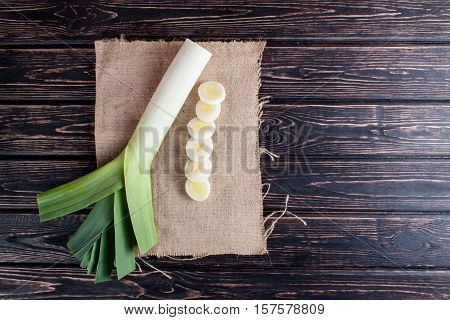 Ripe fresh leek on wood desk. Food ingredients