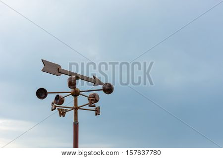 Beautiful blue sky with compass for navigator
