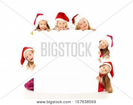Group of Christmas kids at the party with white blank