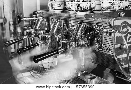 Houten The Netherlands - August 26 2016: Making coffee on a professional coffee machine for cappuccino.