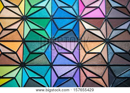 Eye Shadow palette of different colors shaped like a flower