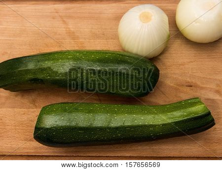 Zucchini & onions on a cutting board
