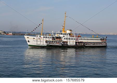 ISTANBUL TURKEY - SEPTEMBER 15 2016: Sehir Hatlari ferry carry passengers between Asian and European sides of Istanbul. Sehir Hatlari was established in 1844 and now carry 150000 passengers a day.