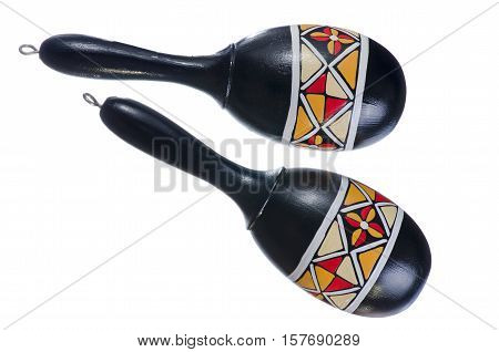 Maracas black with an antique pattern on a white background