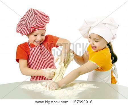Happy little chefs preparing dough isolated on white