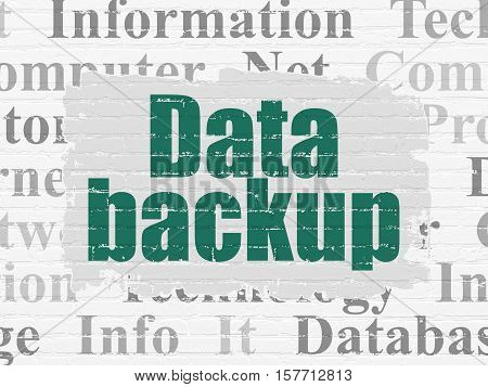 Data concept: Painted green text Data Backup on White Brick wall background with  Tag Cloud