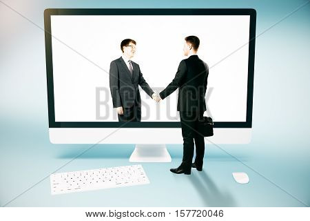 Businessperson shaking hands with abstract digital partner through huge computer screen. Online business and partnership concept. 3D Rendering