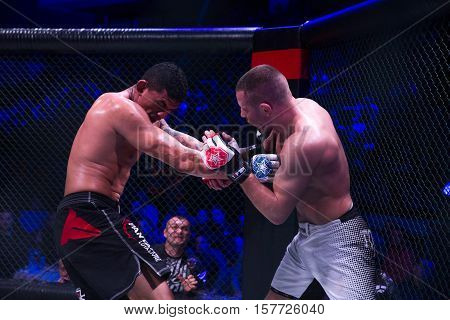 NOVI SAD SERBIA - NOVEMBER 05 2016 : MMA - SBC FIGHT TURNAMENT. ATHLETES IN THE RING EXTREME SPORT. FIGHT NIGHT PROFESIONAL ATHLETESSELECTIVE FOCUS WITH SHALLOW DEPTH OF FIELD NOVEMBER 05 2016 NOVI SAD SERBIA
