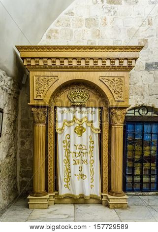 JERUSALEM ISRAEL - OCTOBER 5: The Holy Ark with curtain covering containing the Holy Torah old testament scrolls in the tomb of King David Jerusalem Israel on October 5 2016