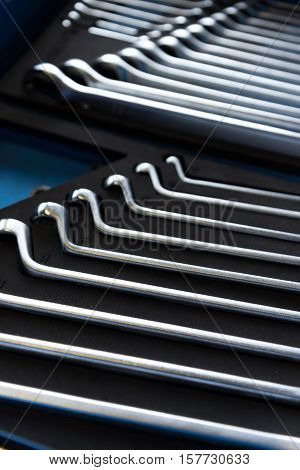 Necessary tools. Close up of wrenches lying together
