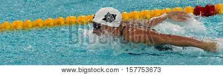 Hong Kong China - Oct 29 2016. Hungarian Olympic world and European champion swimmer Katinka Hosszu swimming butterfly. FINA Swimming World Cup Preliminary Heats Victoria Park Swimming Pool.