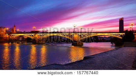 Puente Isabel II bridge in Triana Seville sunset of Andalusia Spain