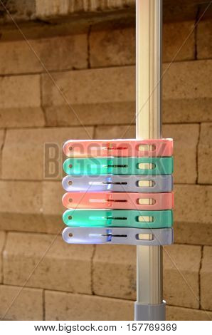 Pastal plastic clothes pin on clothe line