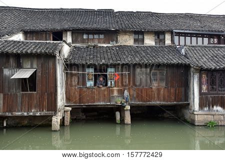 WUZHEN CHINA - MARCH 24: Old Town of Wuzhen on March 24 2016 in Wuzhen China. Wuzhen is a historic scenic town located in northern Zhejiang Province China