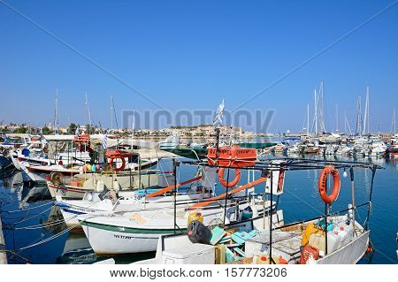 RETHYMNO, CRETE - SEPTEMBER 15, 2016 - Traditional Greek fishing boats in the harbour Rethymno Crete Greece Europe, September 15, 2016.