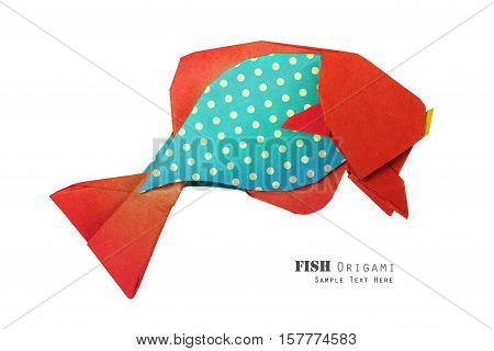 Origami paper red blue plka dot fish on white background