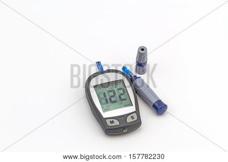 blood glucose meter the blood sugar value is measured on a finger