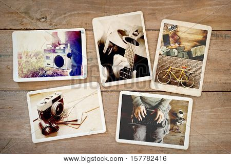 Photo album of hipster lifestyle journey trip in summer on wood table. instant photo of vintage camera - vintage and retro style