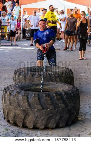 Uzhgorod Ukraine - August 28 2016: Strongmen perform exercise during the 13th power tournament 