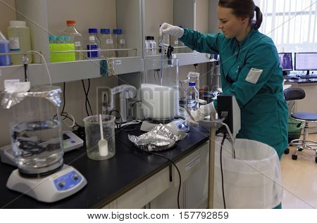 ST. PETERSBURG, RUSSIA - NOVEMBER 16, 2016: Researchers at work in the High-Throughput Biotechnology Laboratory of BIOCAD. It is one of the full-cycle drug development and manufacturing companies