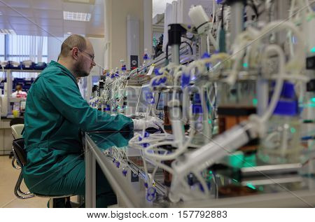 ST. PETERSBURG, RUSSIA - NOVEMBER 16, 2016: Researchers at work in the High-Throughput Biotechnology Laboratory of BIOCAD. It is one of the few full-cycle drug development and manufacturing companies