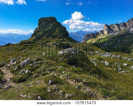 View of Gschoellkopf mountain peak at Rofan, Brandenberg Alpine pasture in Tyrol, Austria with blurred mountain range during Autumn, Europe