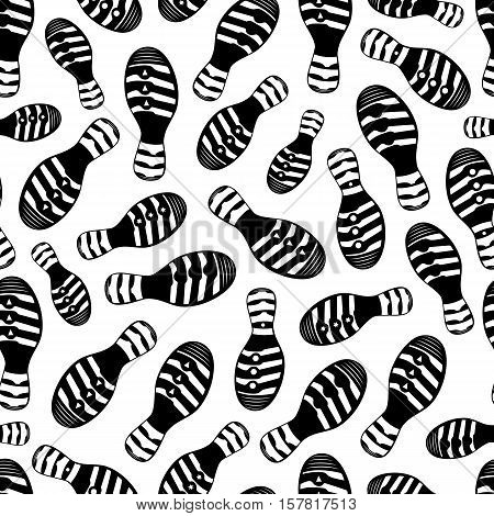 Vector seamless pattern with traces of shoes on a white background