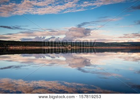 Reflected Sky in Kielder Reservoir, Kielder Water and Forest Park in Northumberland has the largest man made lake in Northern Europe. The reservoir sits in the North Tyne Valley with the river flowing through it